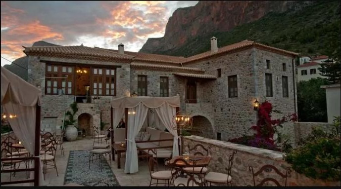 Archontiko Hatzipanayioti, a 1809 stone mansion in Leonidio, at sunset