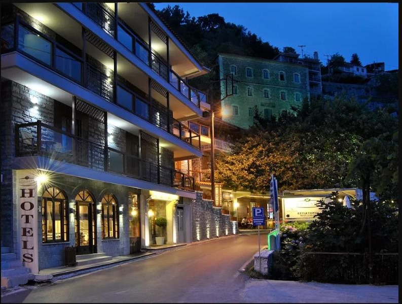 Maniatis Hotels & Resorts on the village street of Lagkadia at night