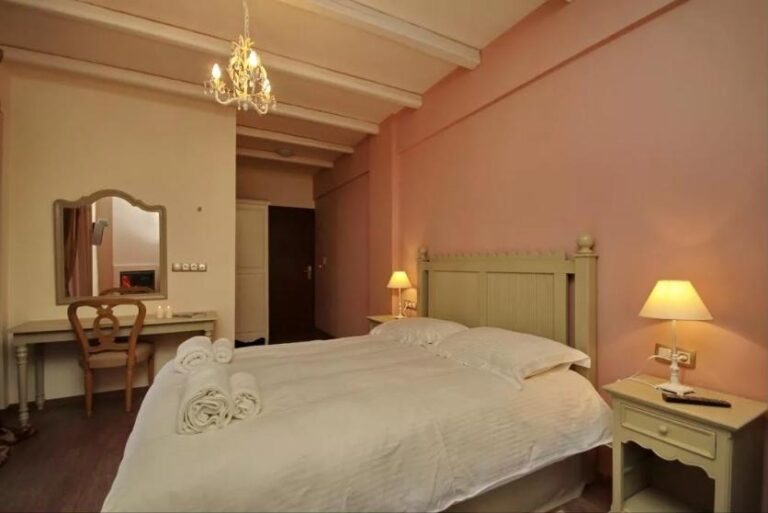 Room with fireplace at Thisoa Hotel, Mount Mainalon