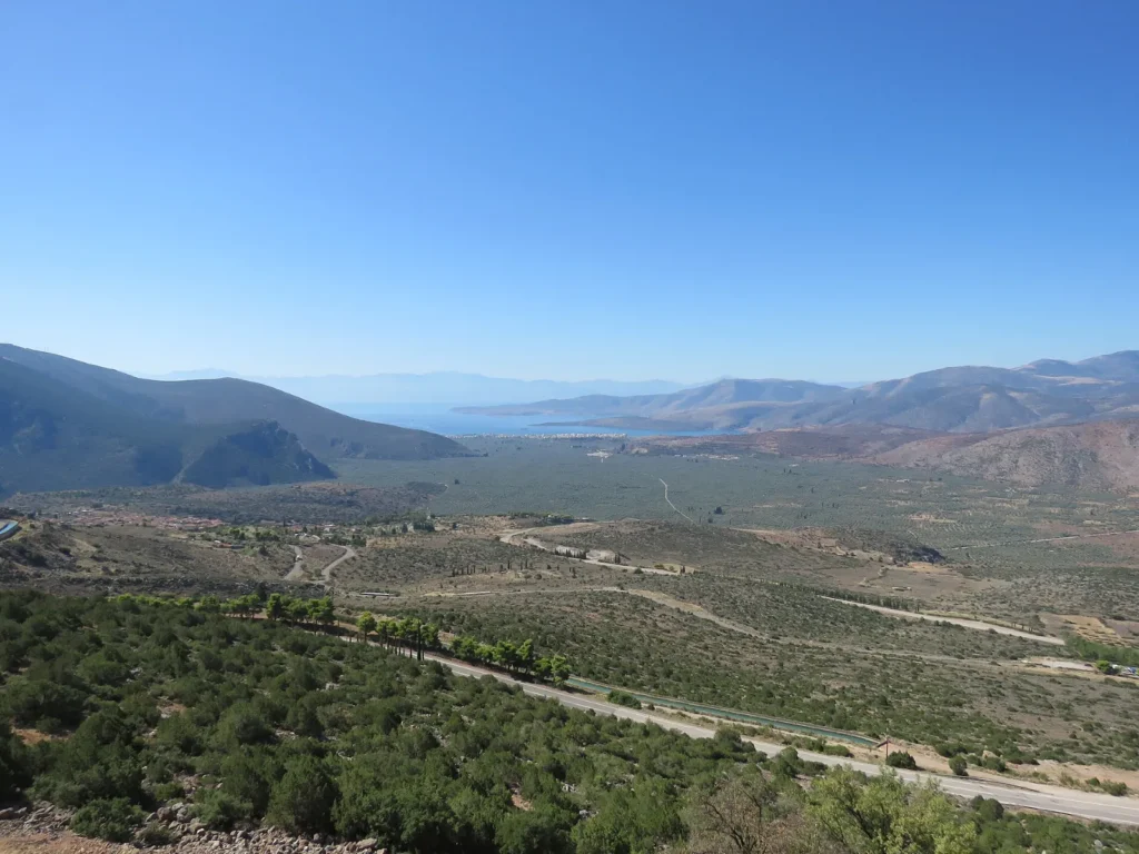 The olive grove and the port of Itea seen from Delphi